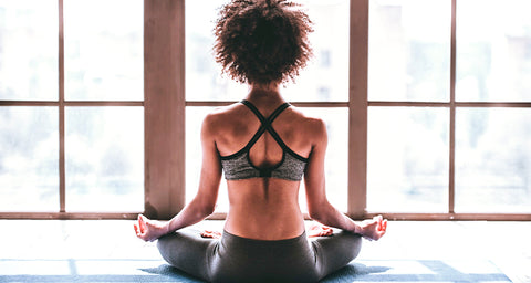 11 ways to be productive at home - woman meditating